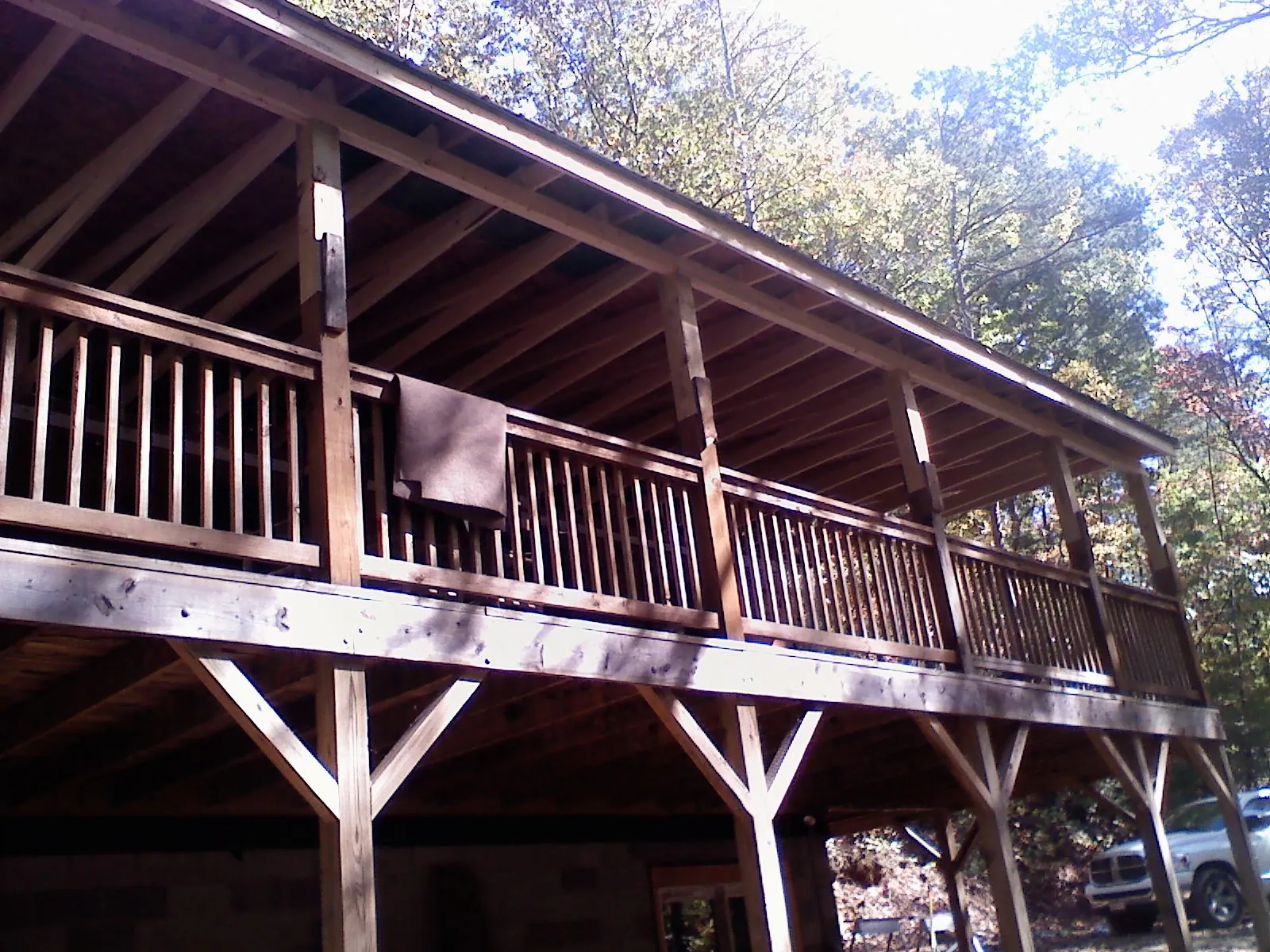 Timber framing under a new elevated porch and deck — Roof Leak Repair in Jamaica by Roofing Brothers